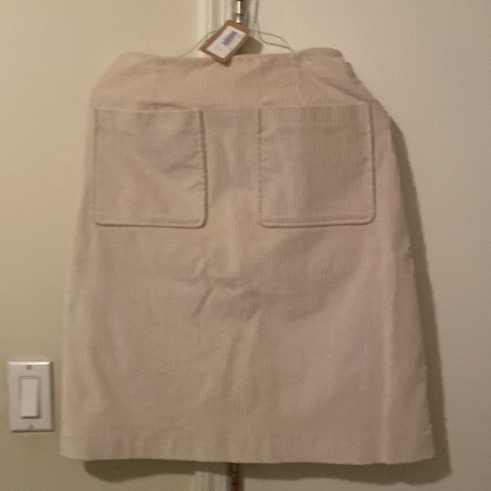 Never worn  cream corduroy skirt with 2 front pockets